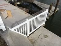 Custom built closed picket vinyl fence transition